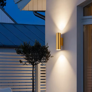 Upper and lower cylindrical wash wall lamps
